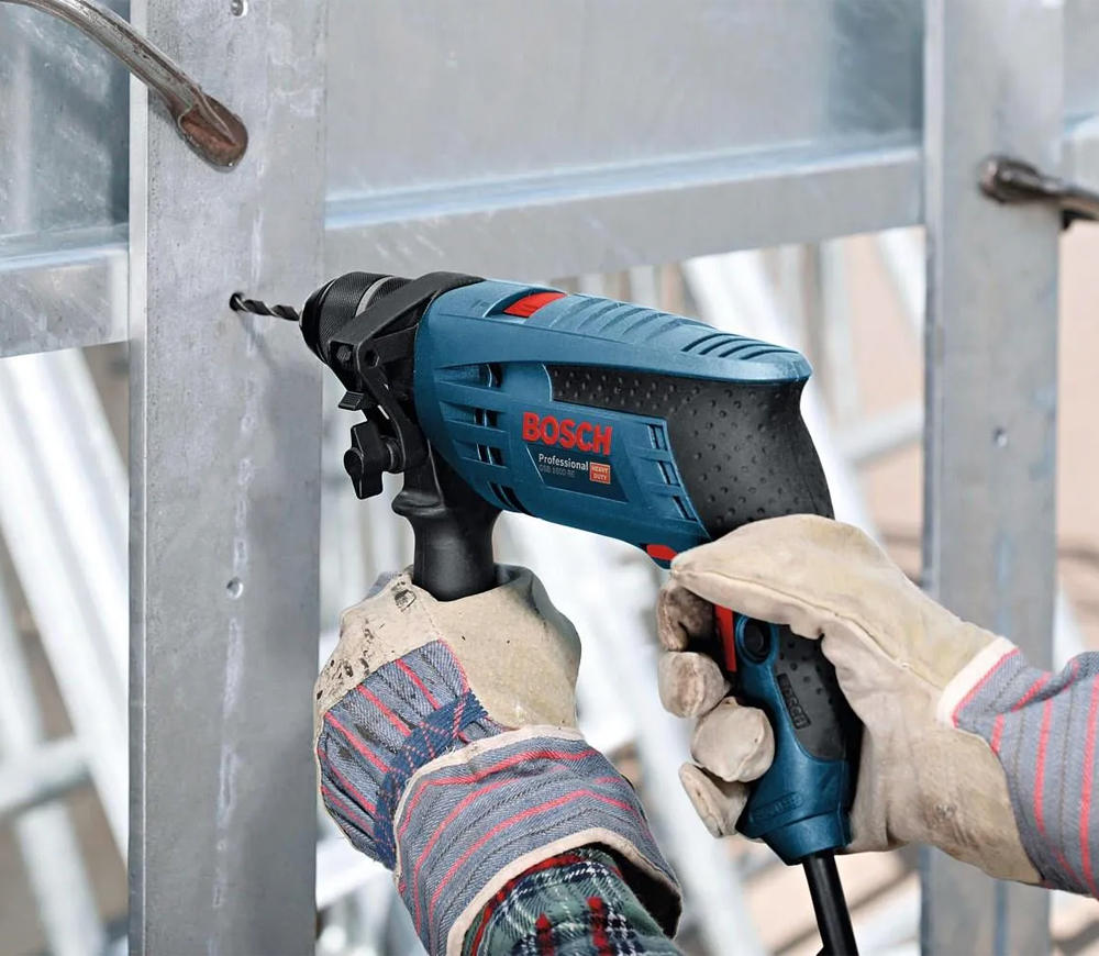 Mașină de găurit cu percutie BOSCH GSB 1600 RE 750w photo 1