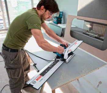Дисковая пила BOSCH GKS 55+G 1200вт 165мм photo 0